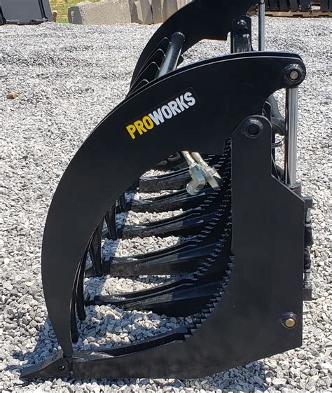 skid steer grapple rake/root the quick claw|extreme duty root rake grapple.